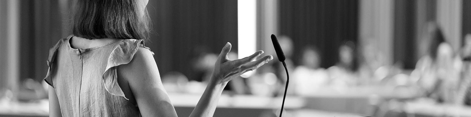 woman at podium